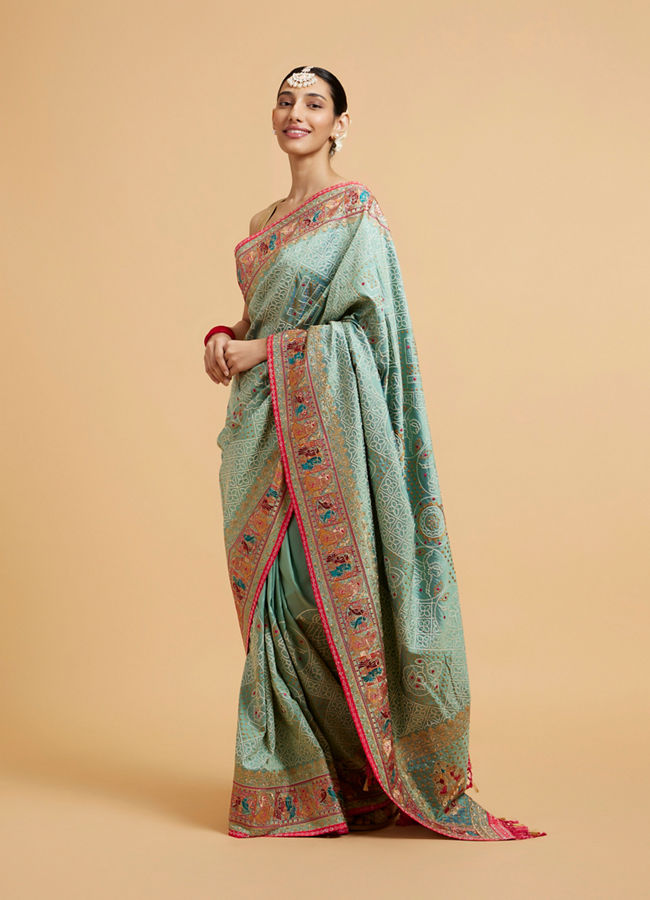 Mohey Women Sea Green Jaal Patterned Saree with Courtly Motifs