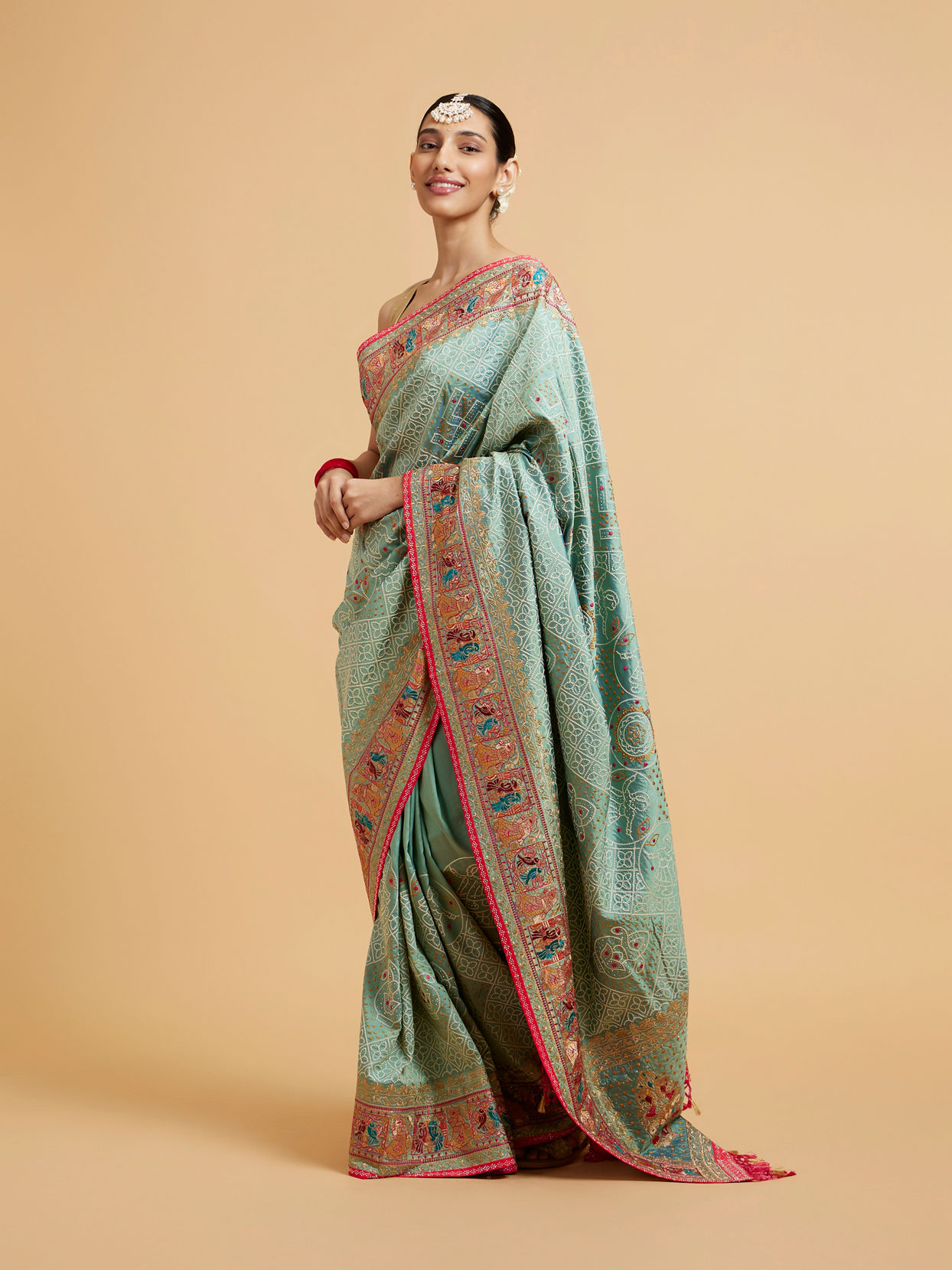 Mohey Women Sea Green Jaal Patterned Saree with Courtly Motifs