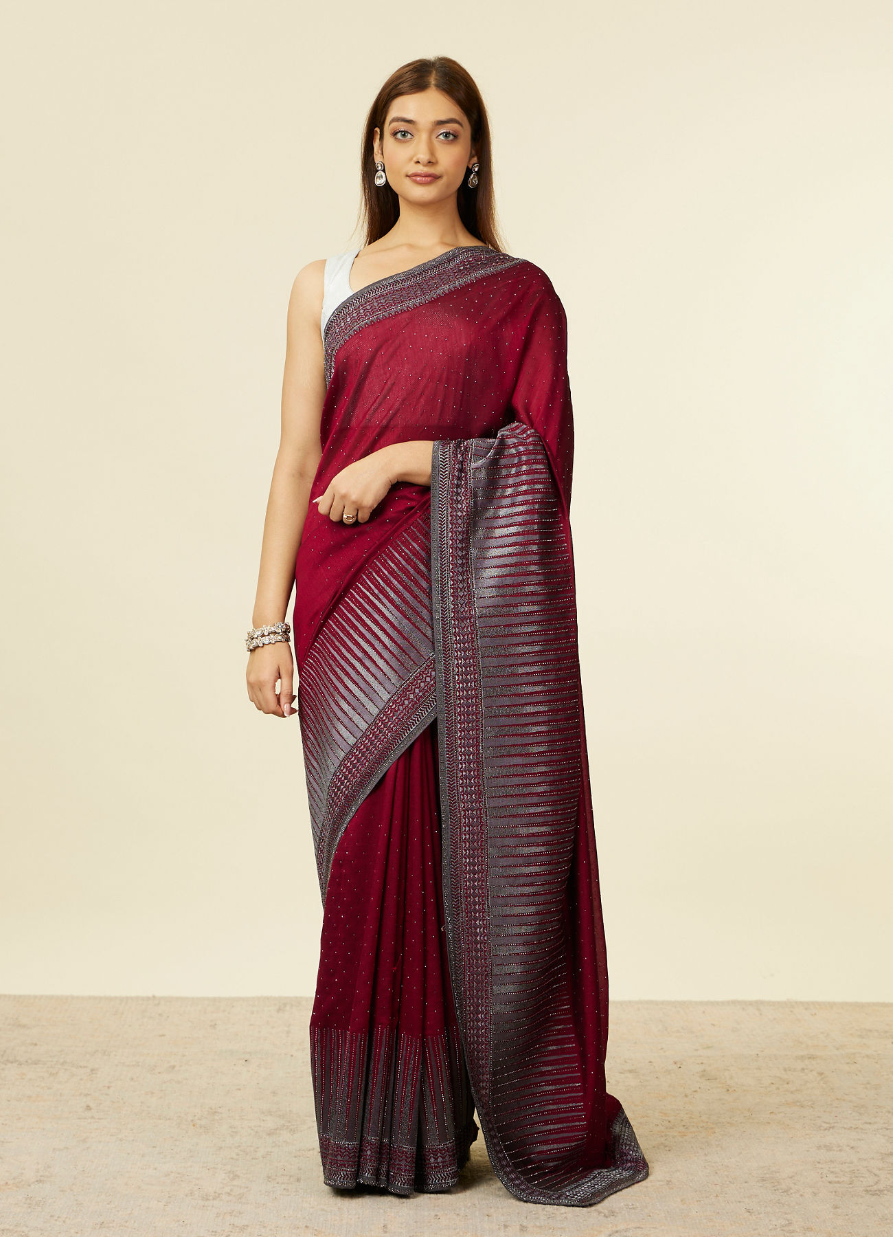 Mohey Women Mauve Wine Stone Embellished Saree