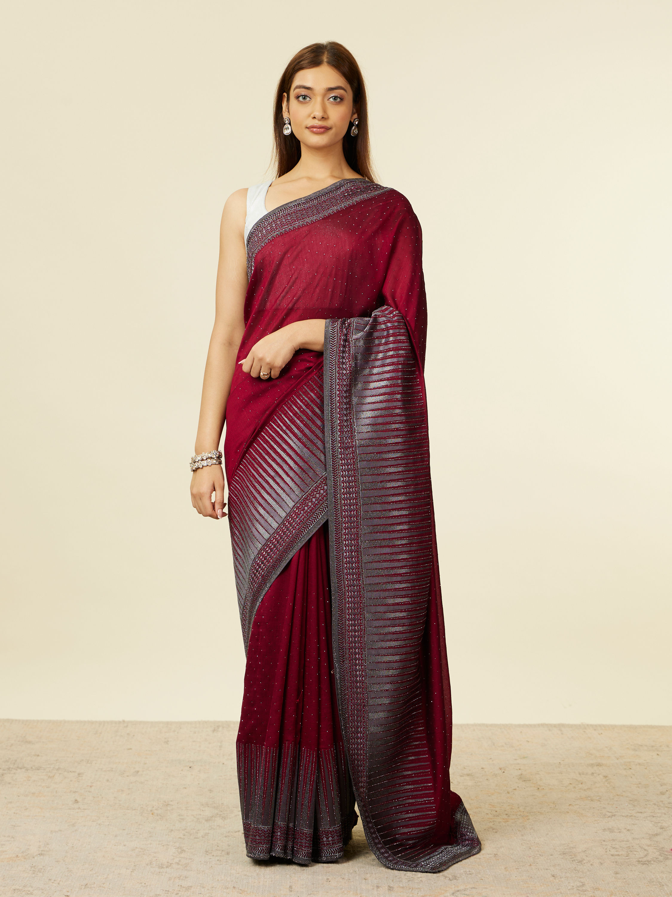 Mohey Women Mauve Wine Stone Embellished Saree