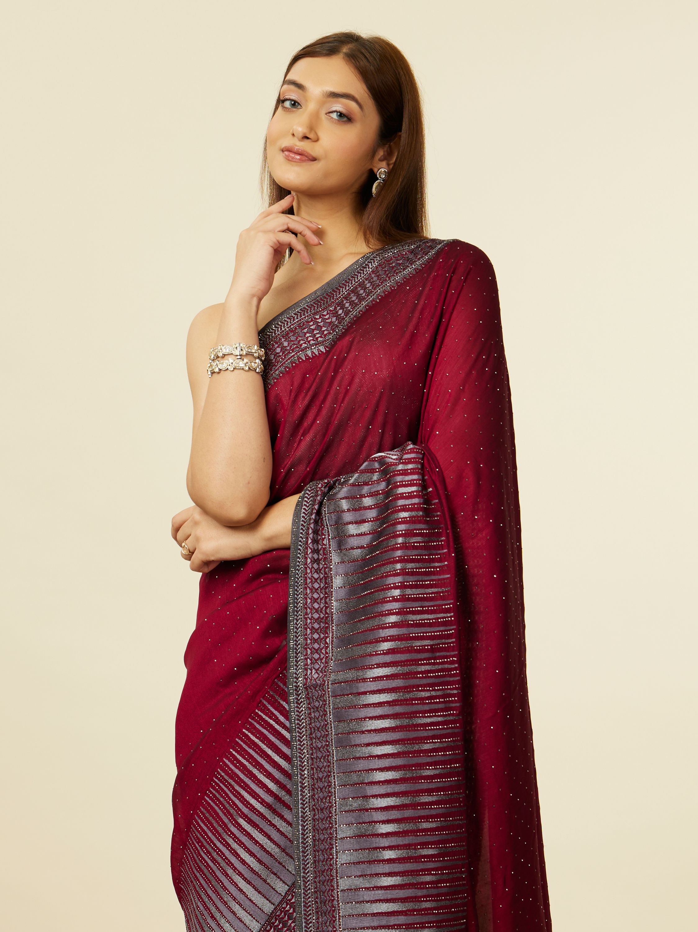 Mohey Women Mauve Wine Stone Embellished Saree