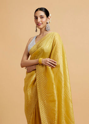 Mohey Women Buttercup Yellow Drop Patterned Saree with Stone Embellishment image number 1