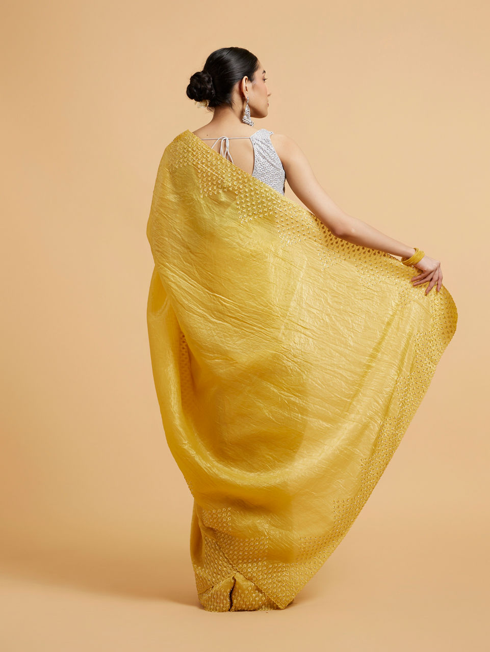 Mohey Women Buttercup Yellow Drop Patterned Saree with Stone Embellishment