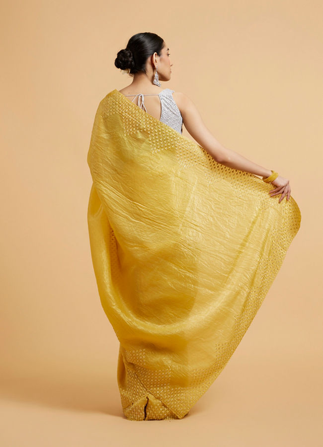 Mohey Women Buttercup Yellow Drop Patterned Saree with Stone Embellishment
