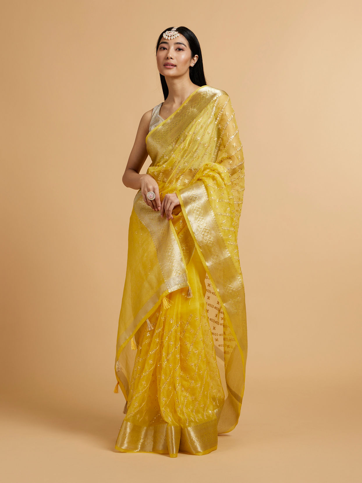 alt message - Mohey Women Light Yellow Embroidered Saree with Sequins image number 0