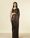 alt message - Mohey Women Kohl Black Jaal Patterned Stone Embellished Saree image number 0