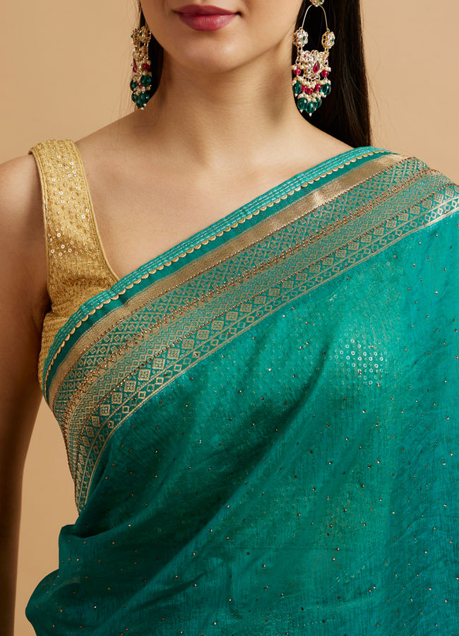 Mohey Women Teal Blue Leaf and Floral Patterned Saree with Stone Embellishments