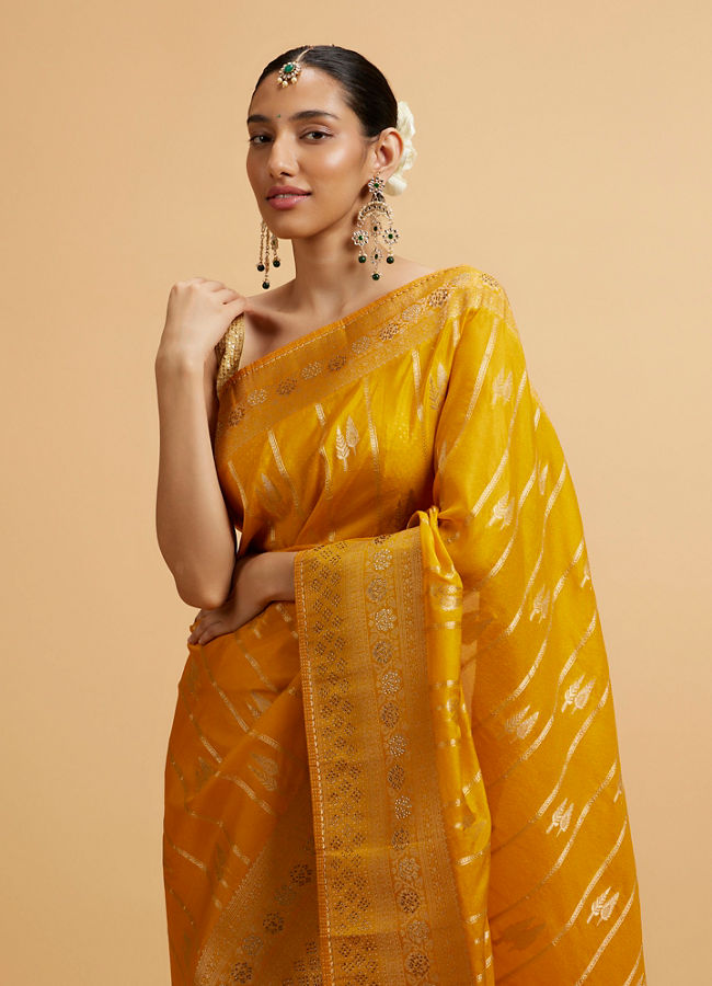 alt message - Mohey Women Mustard Yellow Leaf Patterned Saree with Stone Work image number 1