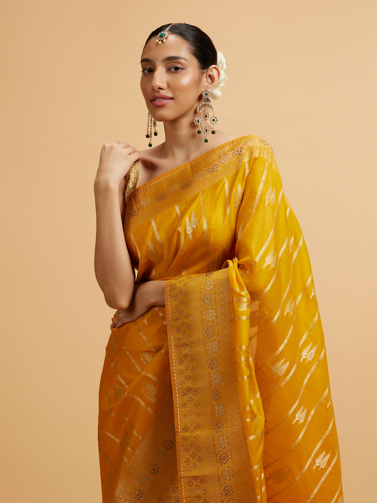 alt message - Mohey Women Mustard Yellow Leaf Patterned Saree with Stone Work image number 1