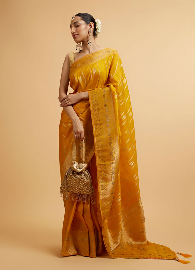 alt message - Mohey Women Mustard Yellow Leaf Patterned Saree with Stone Work image number 0