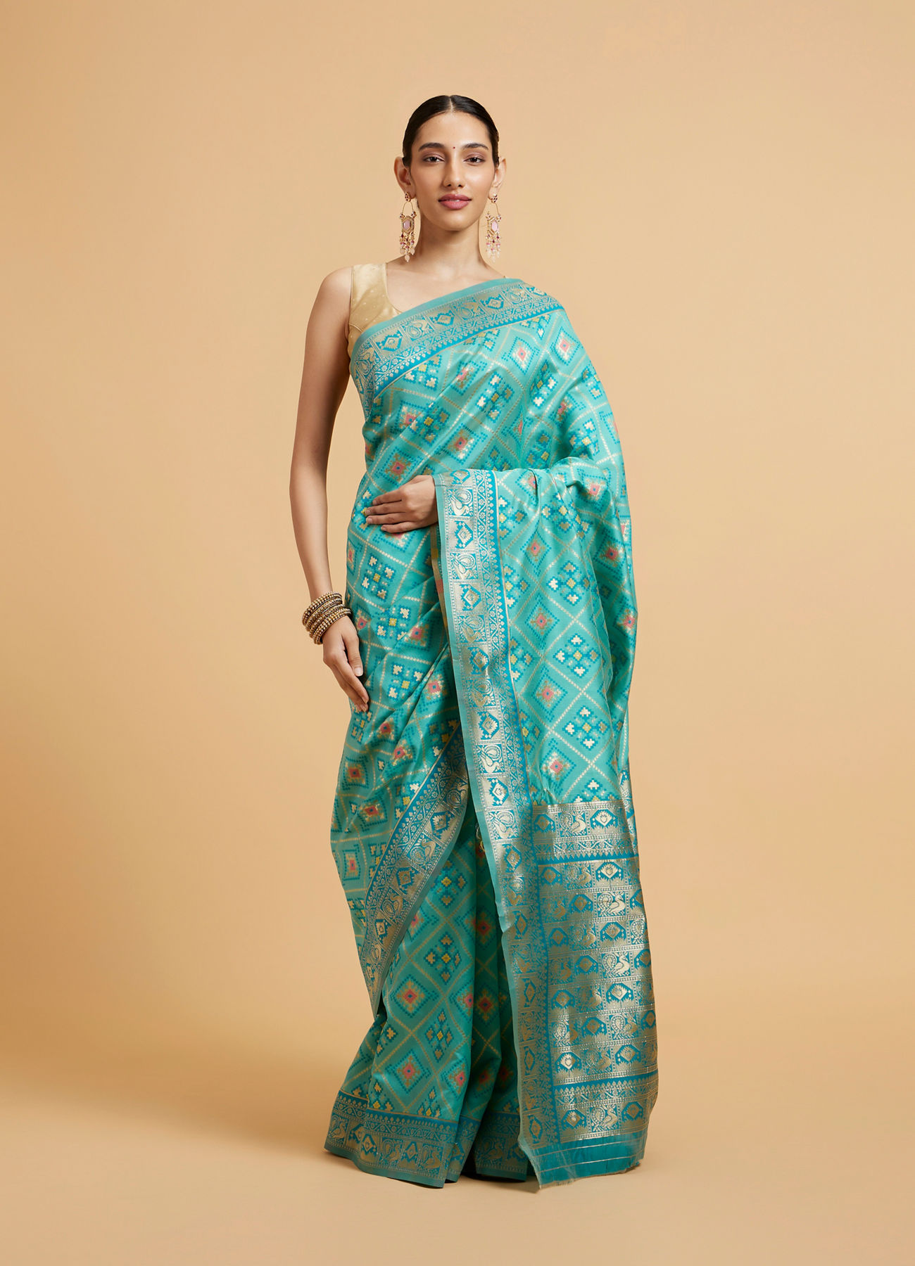 Mohey Women Turquoise Blue Chowkadi Motif Saree with Peacock Motifs on Border