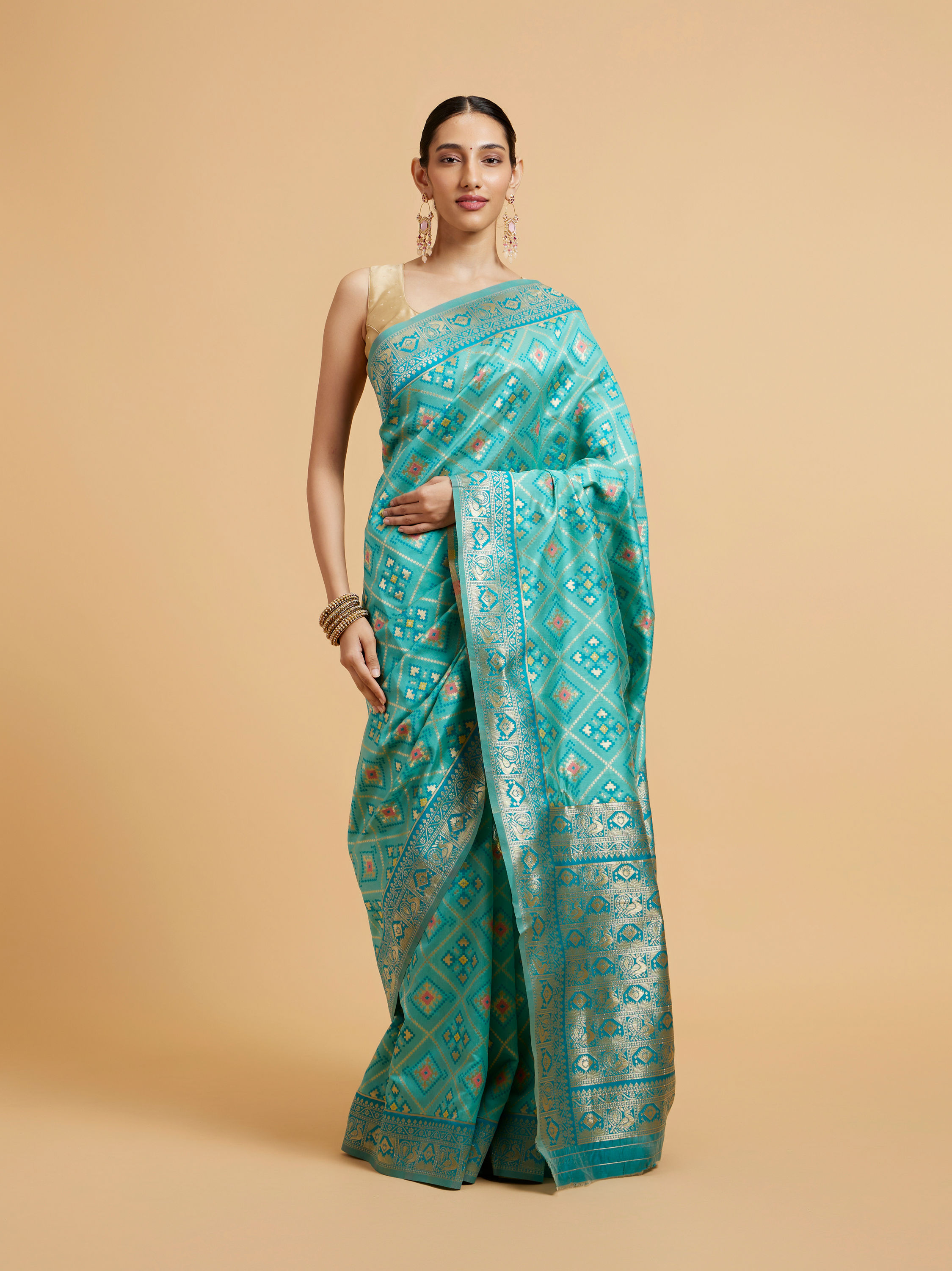 Mohey Women Turquoise Blue Chowkadi Motif Saree with Peacock Motifs on Border