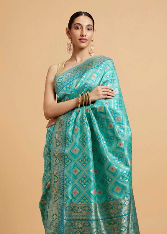 Mohey Women Turquoise Blue Chowkadi Motif Saree with Peacock Motifs on Border