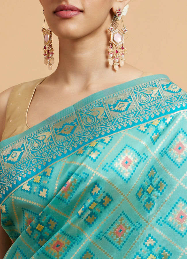 Mohey Women Turquoise Blue Chowkadi Motif Saree with Peacock Motifs on Border