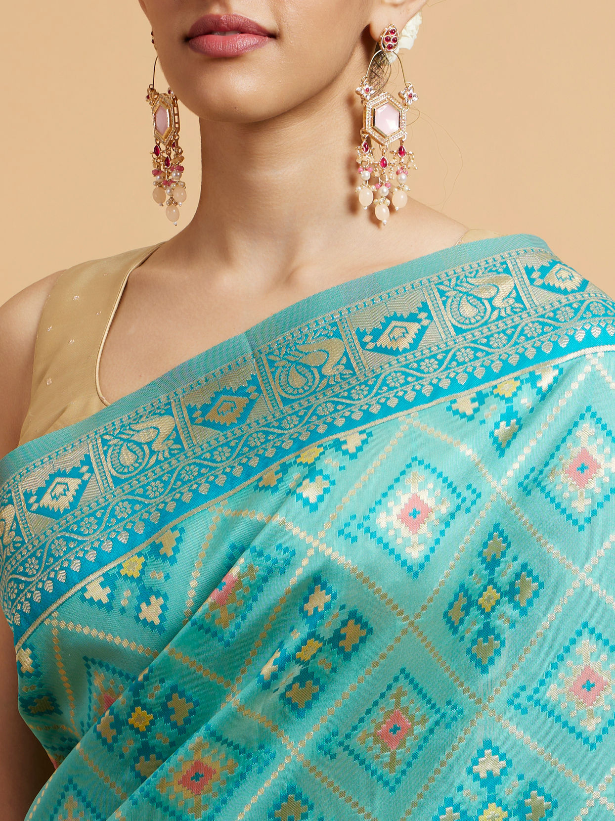 Mohey Women Turquoise Blue Chowkadi Motif Saree with Peacock Motifs on Border