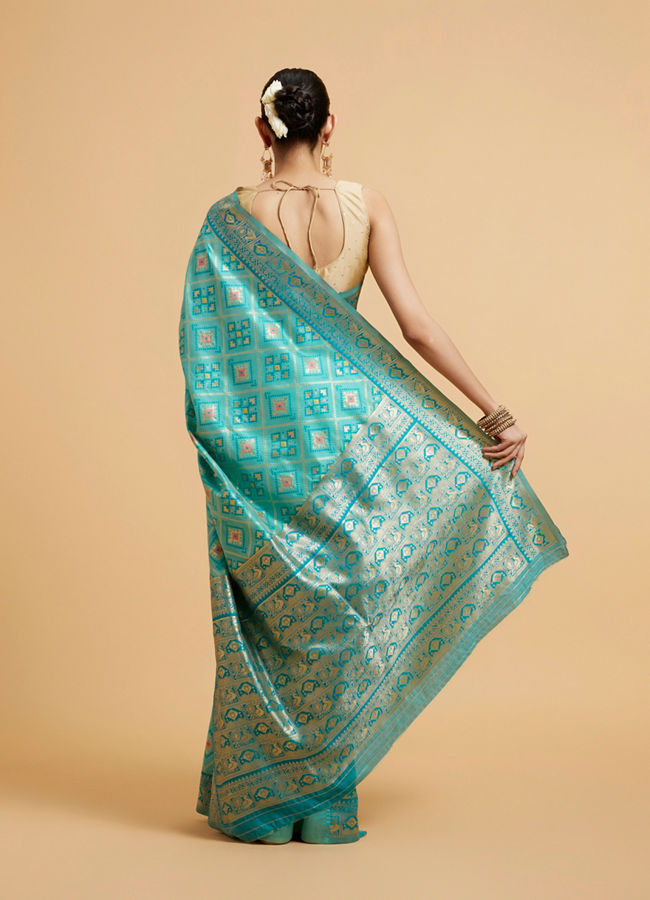 Mohey Women Turquoise Blue Chowkadi Motif Saree with Peacock Motifs on Border