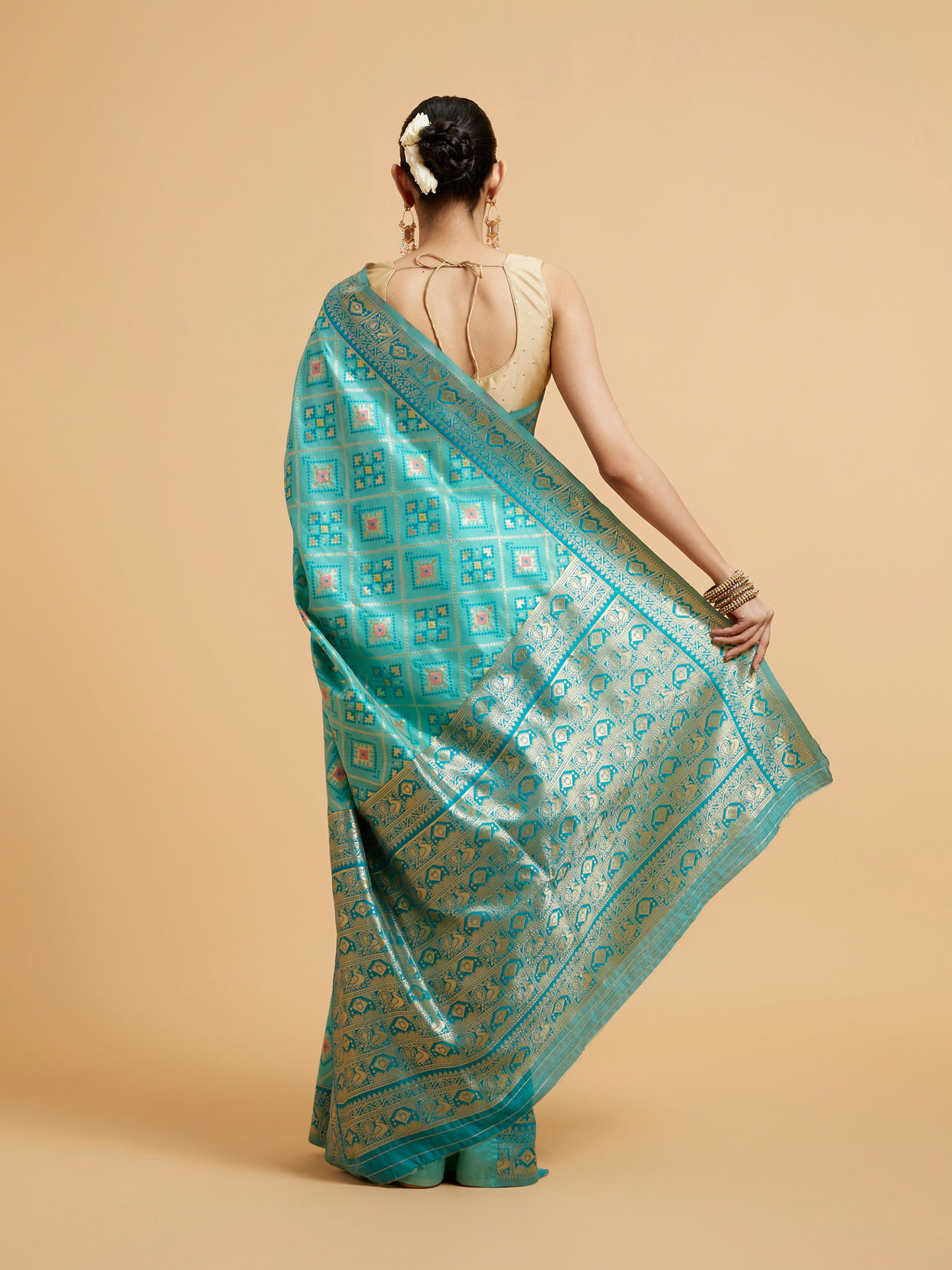 Mohey Women Turquoise Blue Chowkadi Motif Saree with Peacock Motifs on Border