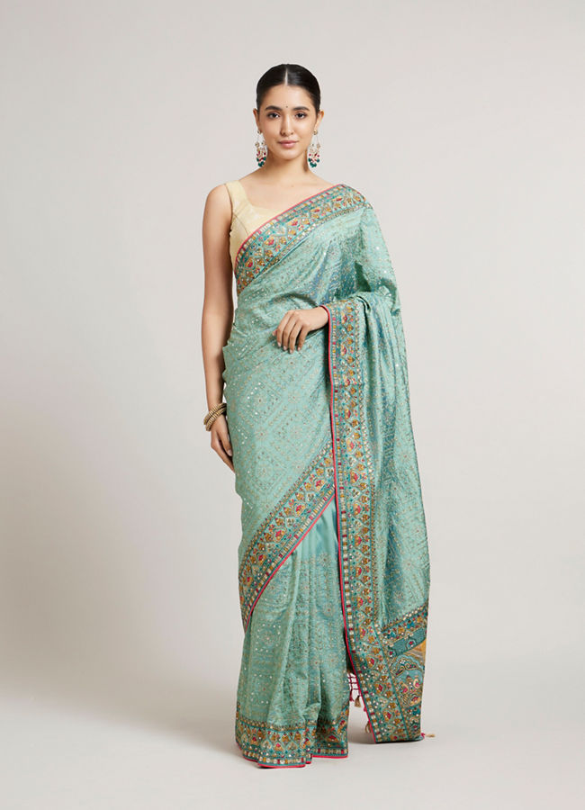Mohey Women Sea Green Floral & Grid Patterned Saree with Sequin Work