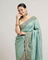 alt message - Mohey Women Sea Green Floral & Grid Patterned Saree with Sequin Work image number 1