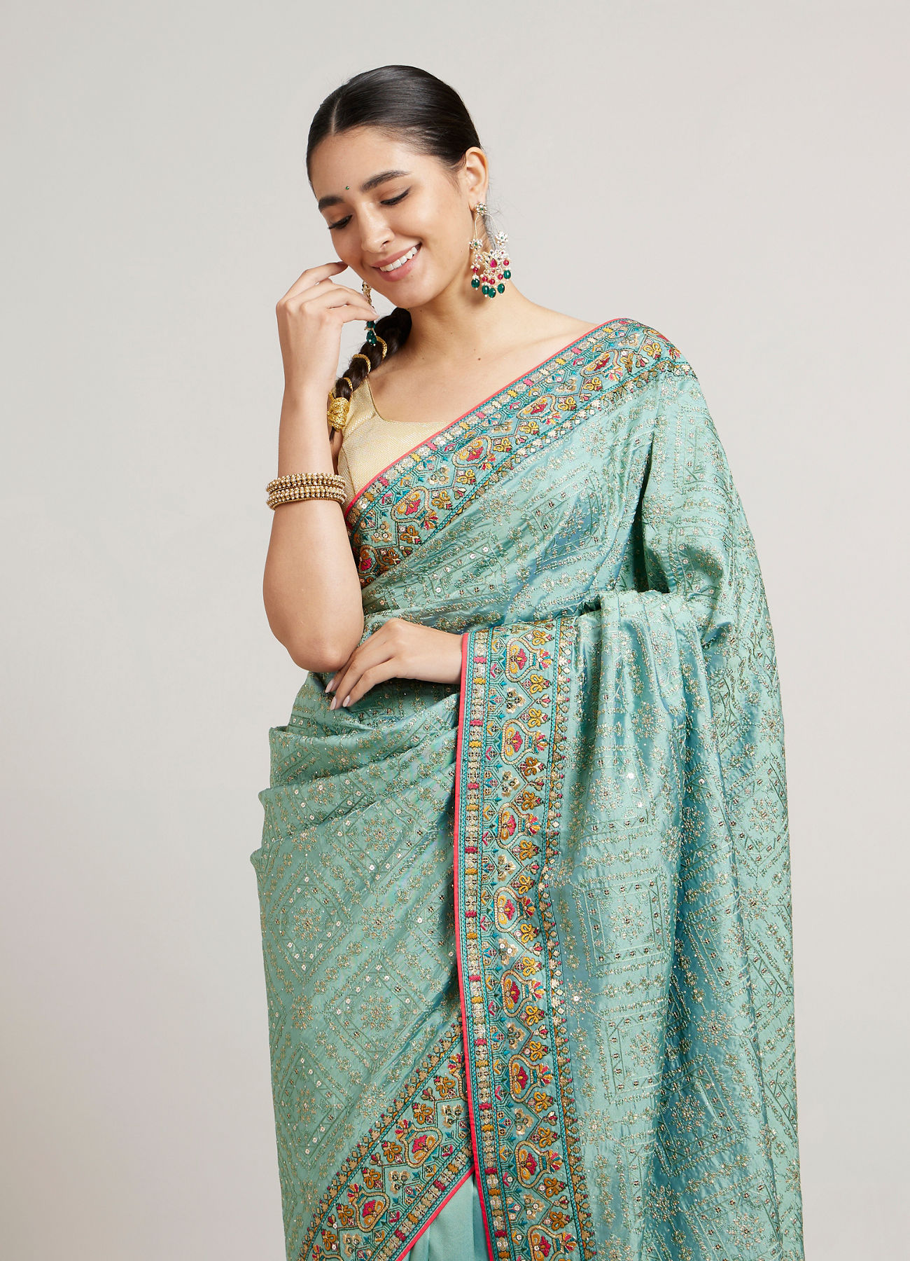 Mohey Women Sea Green Floral & Grid Patterned Saree with Sequin Work