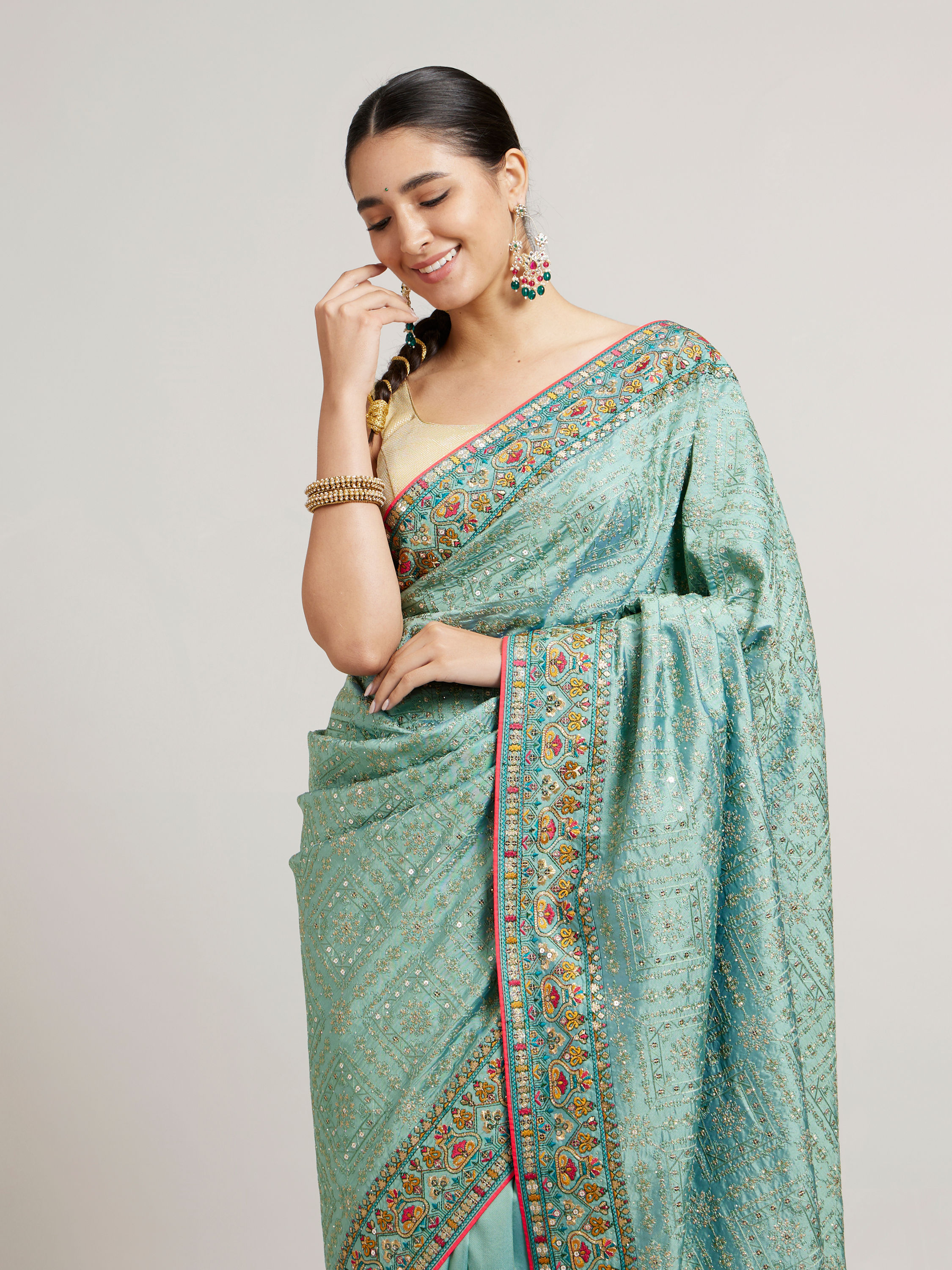 Mohey Women Sea Green Floral & Grid Patterned Saree with Sequin Work