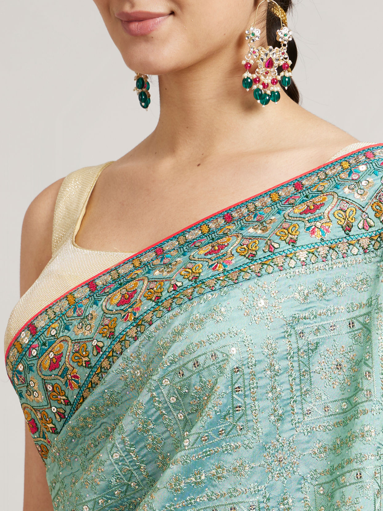 Mohey Women Sea Green Floral & Grid Patterned Saree with Sequin Work
