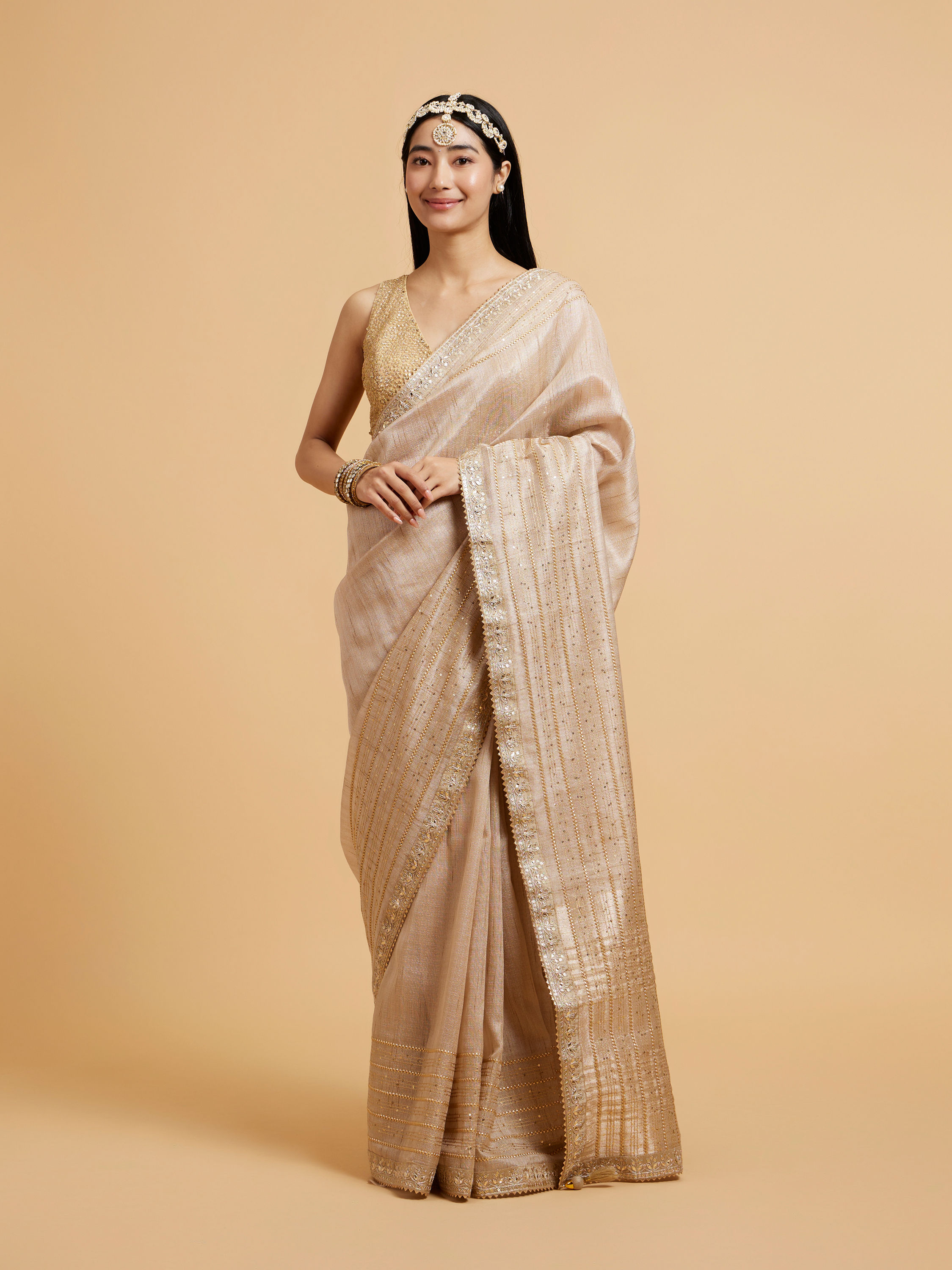 Mohey Women Light Fawn Linear Patterned Saree with Sequin and Stone Work
