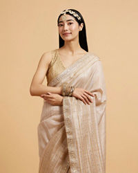 Mohey Women Light Fawn Linear Patterned Saree with Sequin and Stone Work