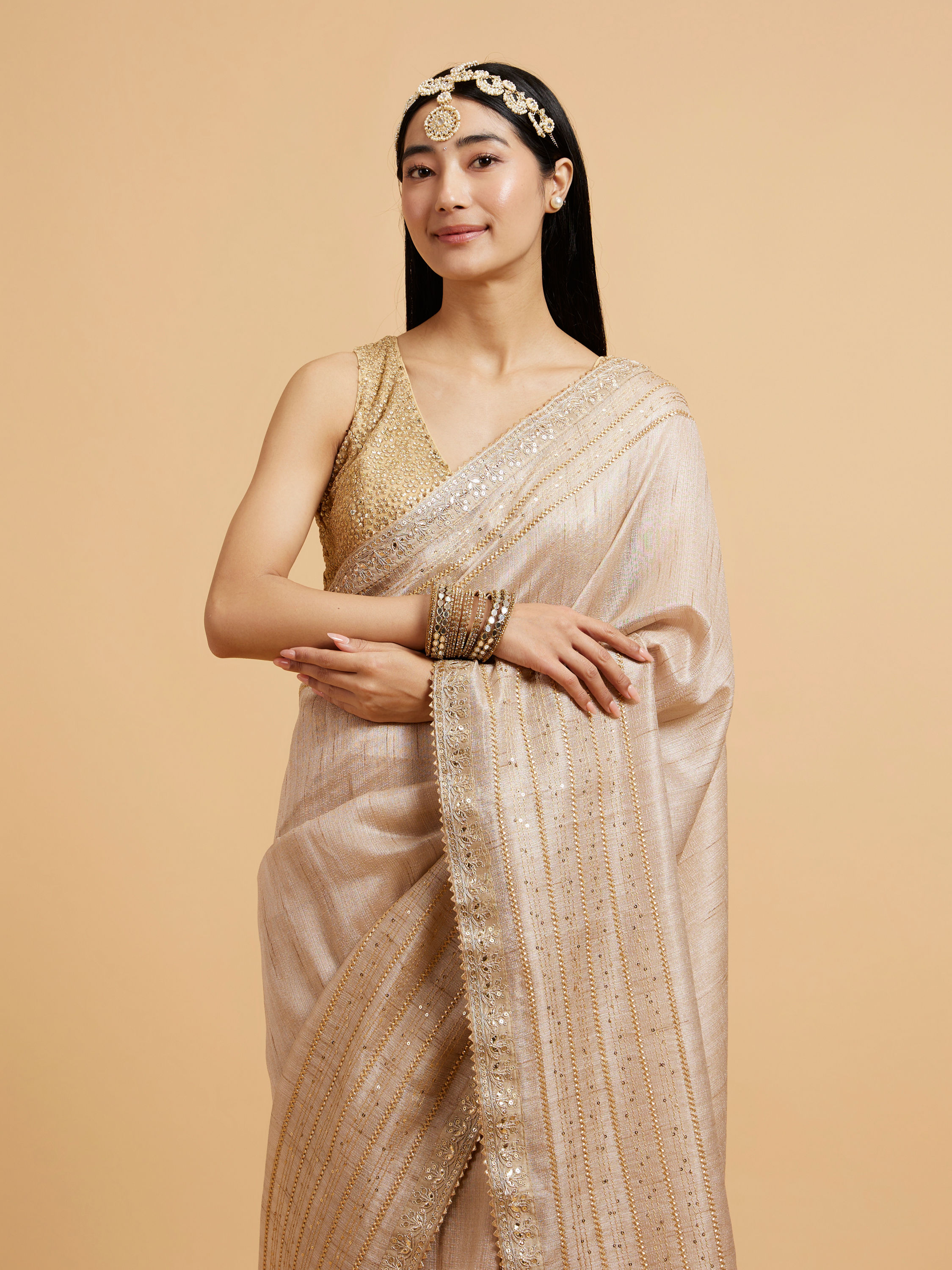 Mohey Women Light Fawn Linear Patterned Saree with Sequin and Stone Work