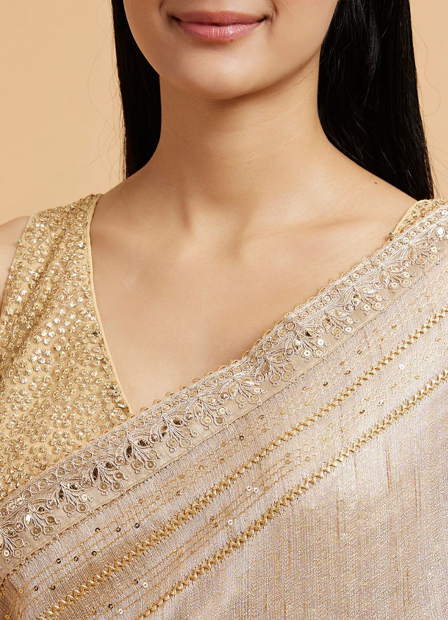 Mohey Women Light Fawn Linear Patterned Saree with Sequin and Stone Work