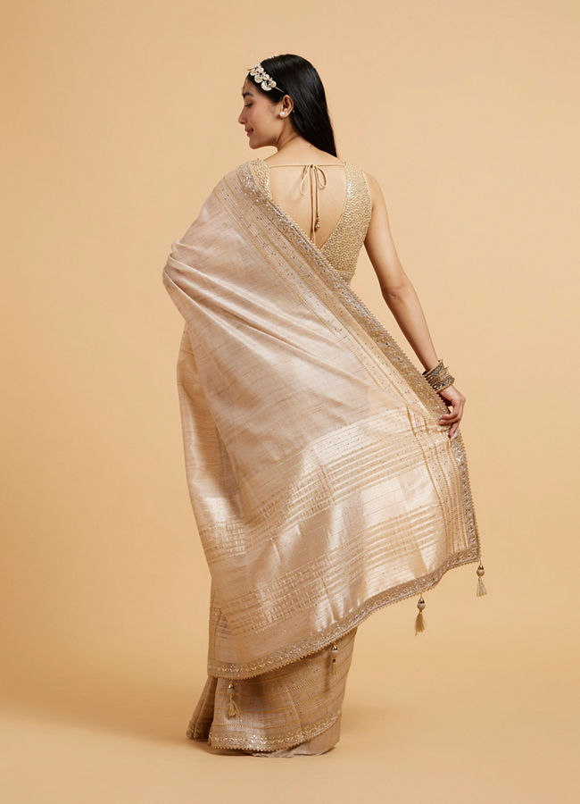 Mohey Women Light Fawn Linear Patterned Saree with Sequin and Stone Work