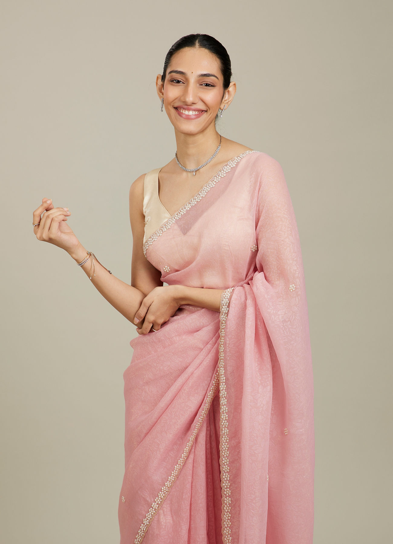 Mohey Women Candy Floss Pink Bel Butii Patterned Saree with Floral Pearl Butas