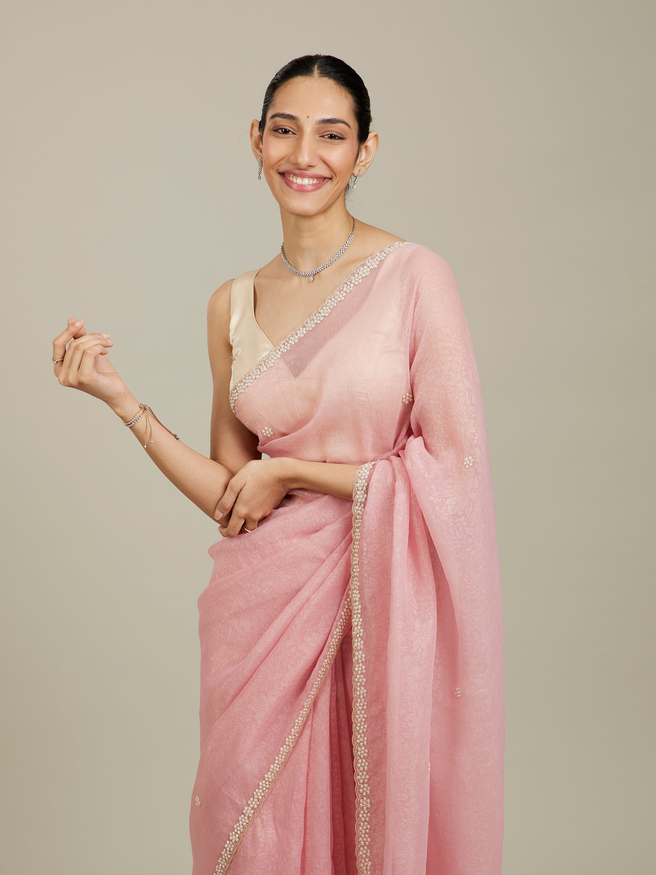 Mohey Women Candy Floss Pink Bel Butii Patterned Saree with Floral Pearl Butas