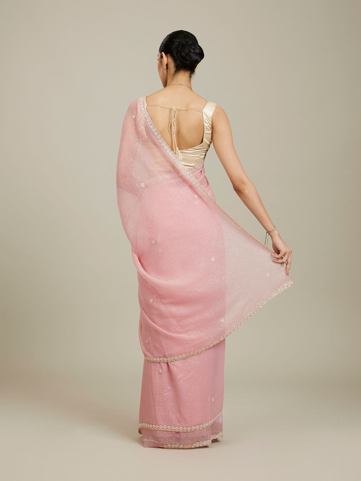 Mohey Women Candy Floss Pink Bel Butii Patterned Saree with Floral Pearl Butas