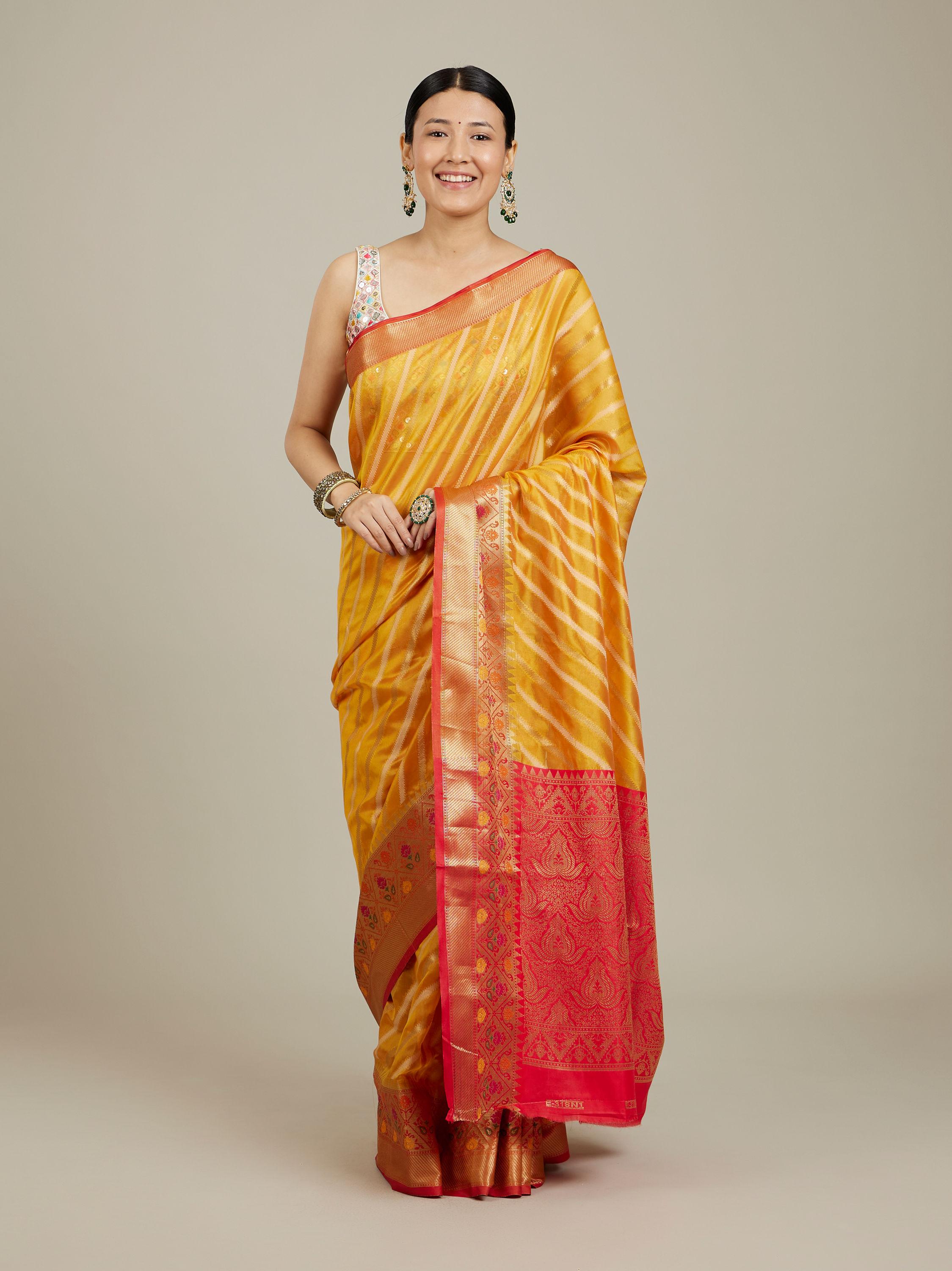 Mohey Women Mustard Yellow Striped Patterned Saree with Floral Motifs