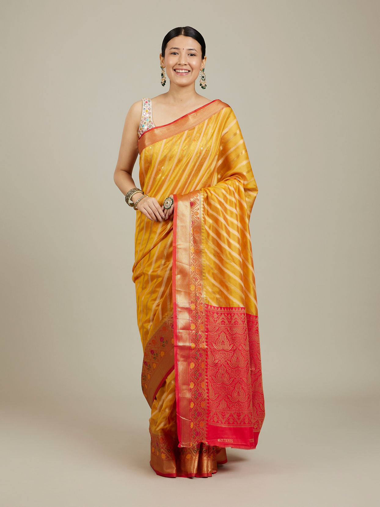 Mohey Women Mustard Yellow Striped Patterned Saree with Floral Motifs on the Border