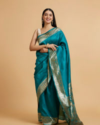 Mohey Women Rama Green Dotted Patterned Saree with Peacock Zari Motifs on the Border