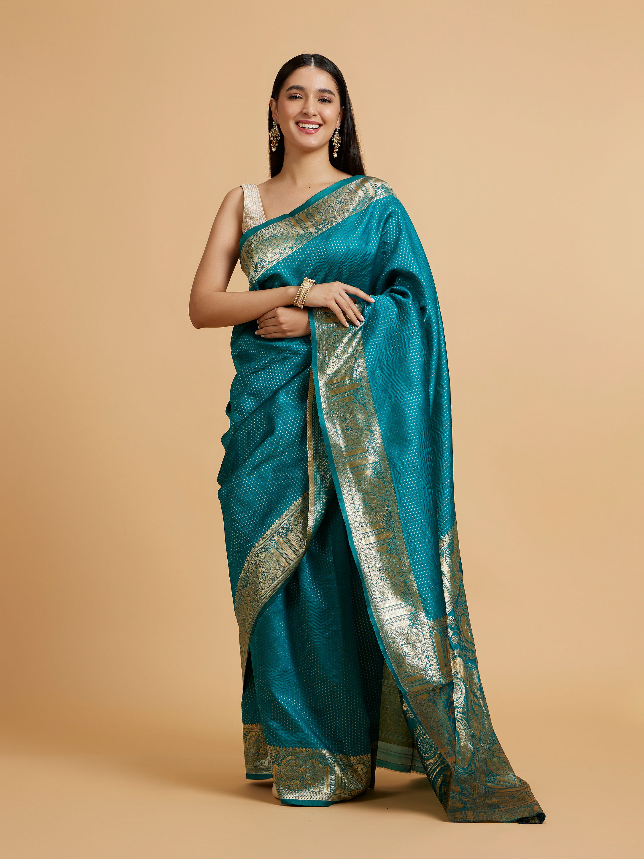 Mohey Women Rama Green Dotted Patterned Saree with Peacock Zari Motifs on the Border