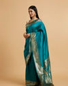 Mohey Women Rama Green Dotted Patterned Saree with Peacock Zari Motifs on the Border