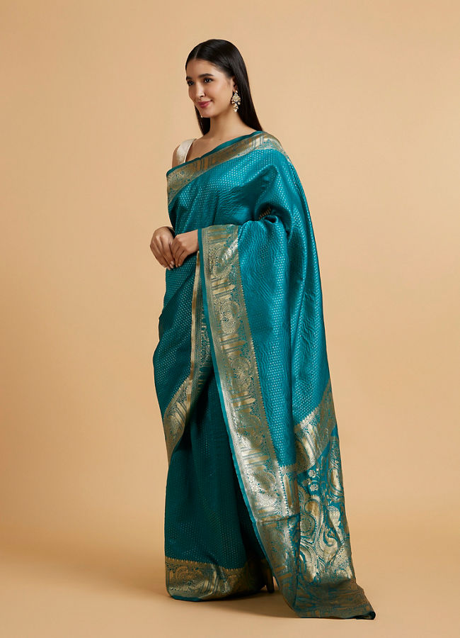 Mohey Women Rama Green Dotted Patterned Saree with Peacock Zari Motifs on the Border