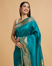 Mohey Women Rama Green Dotted Patterned Saree with Peacock Zari Motifs on the Border