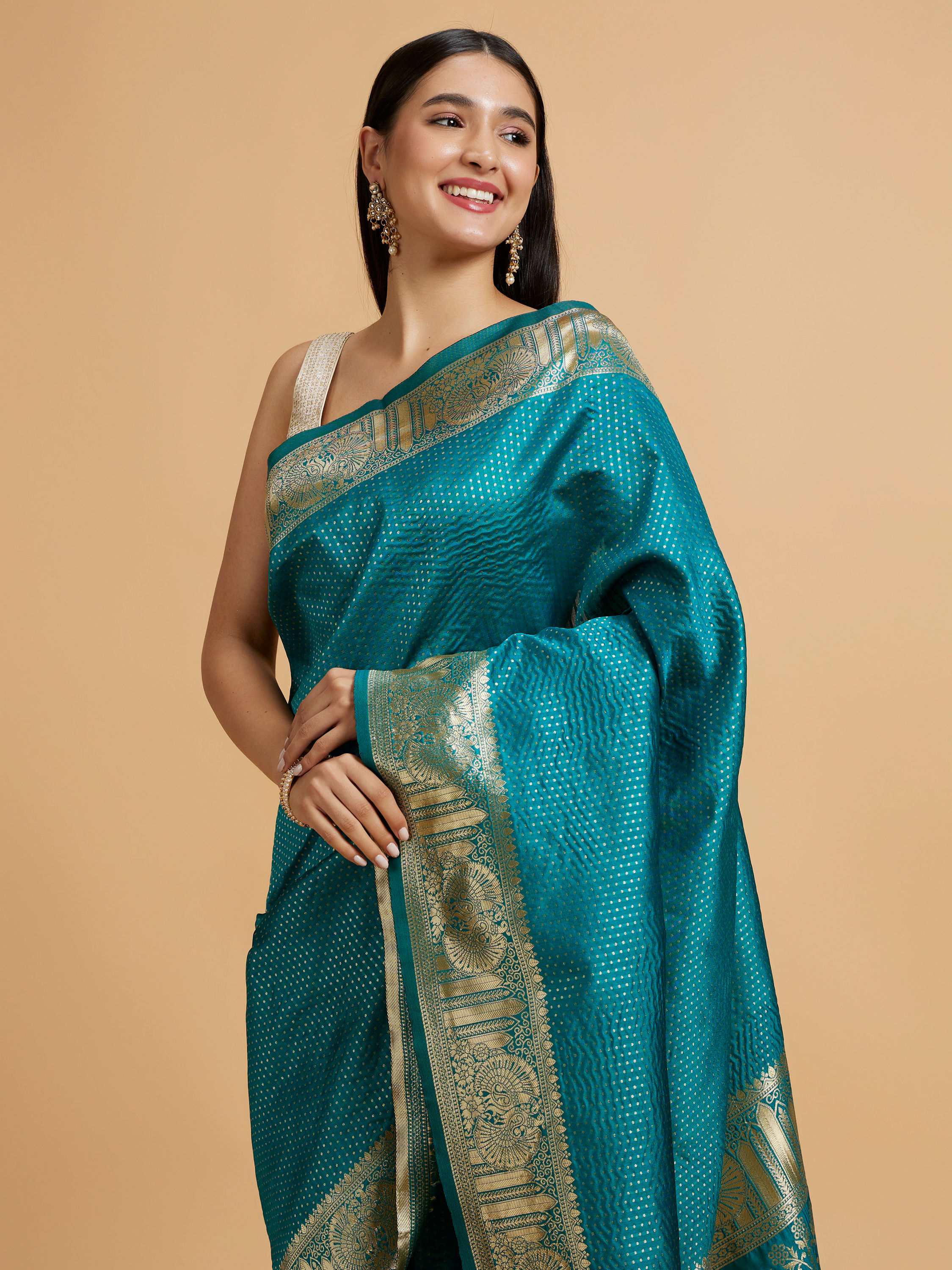 Mohey Women Rama Green Dotted Patterned Saree with Peacock Zari Motifs on the Border
