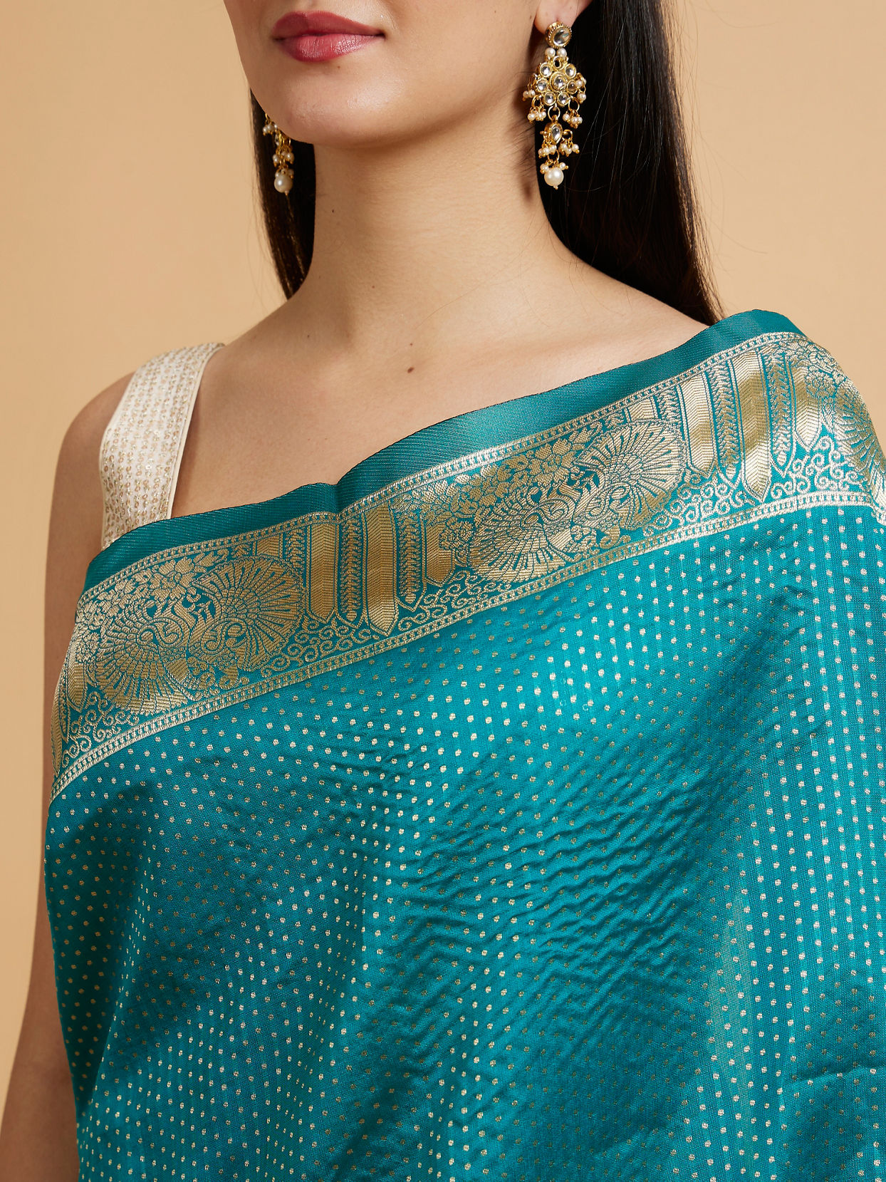Mohey Women Rama Green Dotted Patterned Saree with Peacock Zari Motifs on the Border
