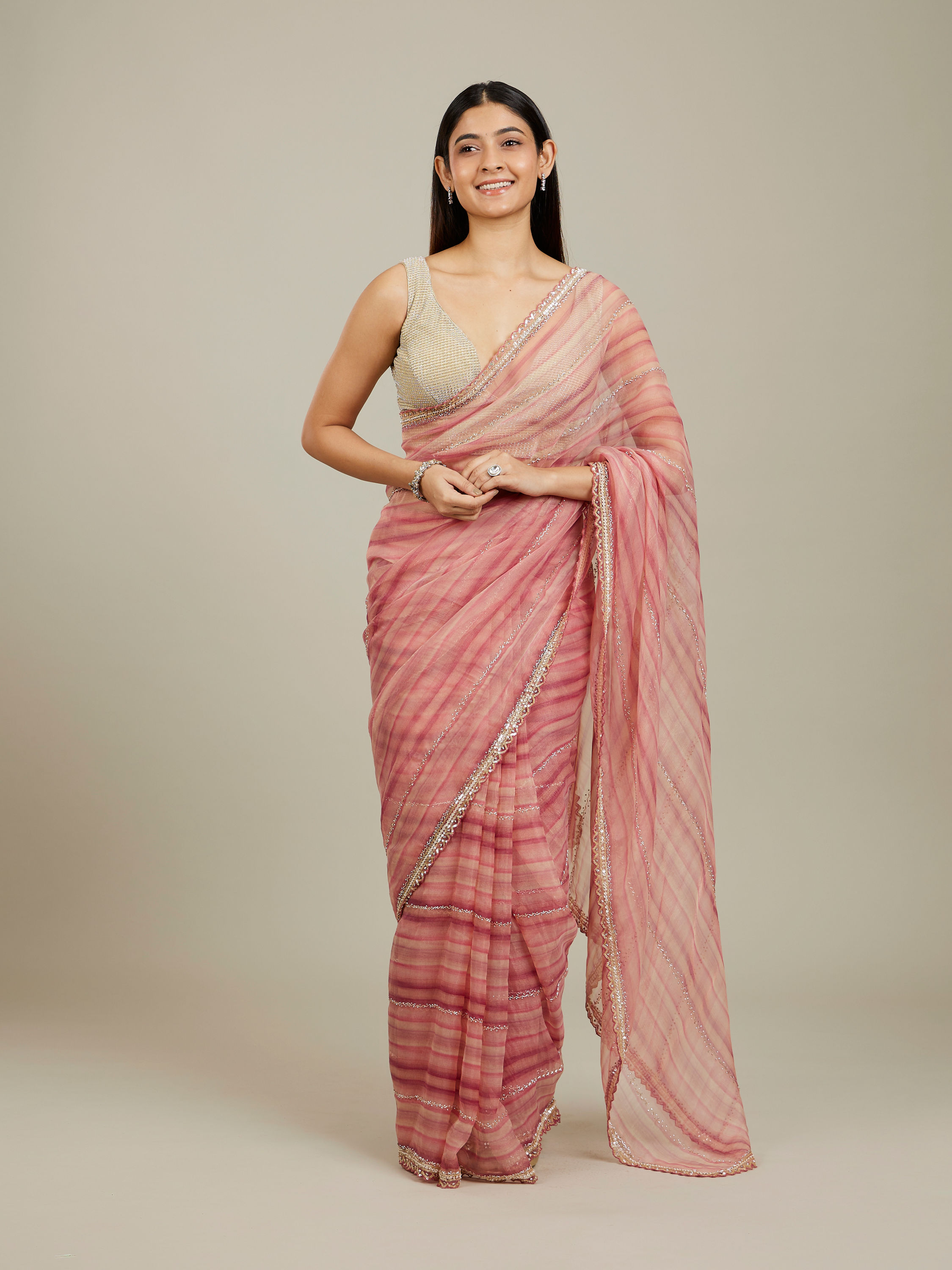 Mohey Women Coral Pink Diagonal Striped Saree with Cutdana and Sequin Work