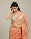 Mohey Women Rust Red Diagonal Striped Saree with Cutdana And Sequin Work