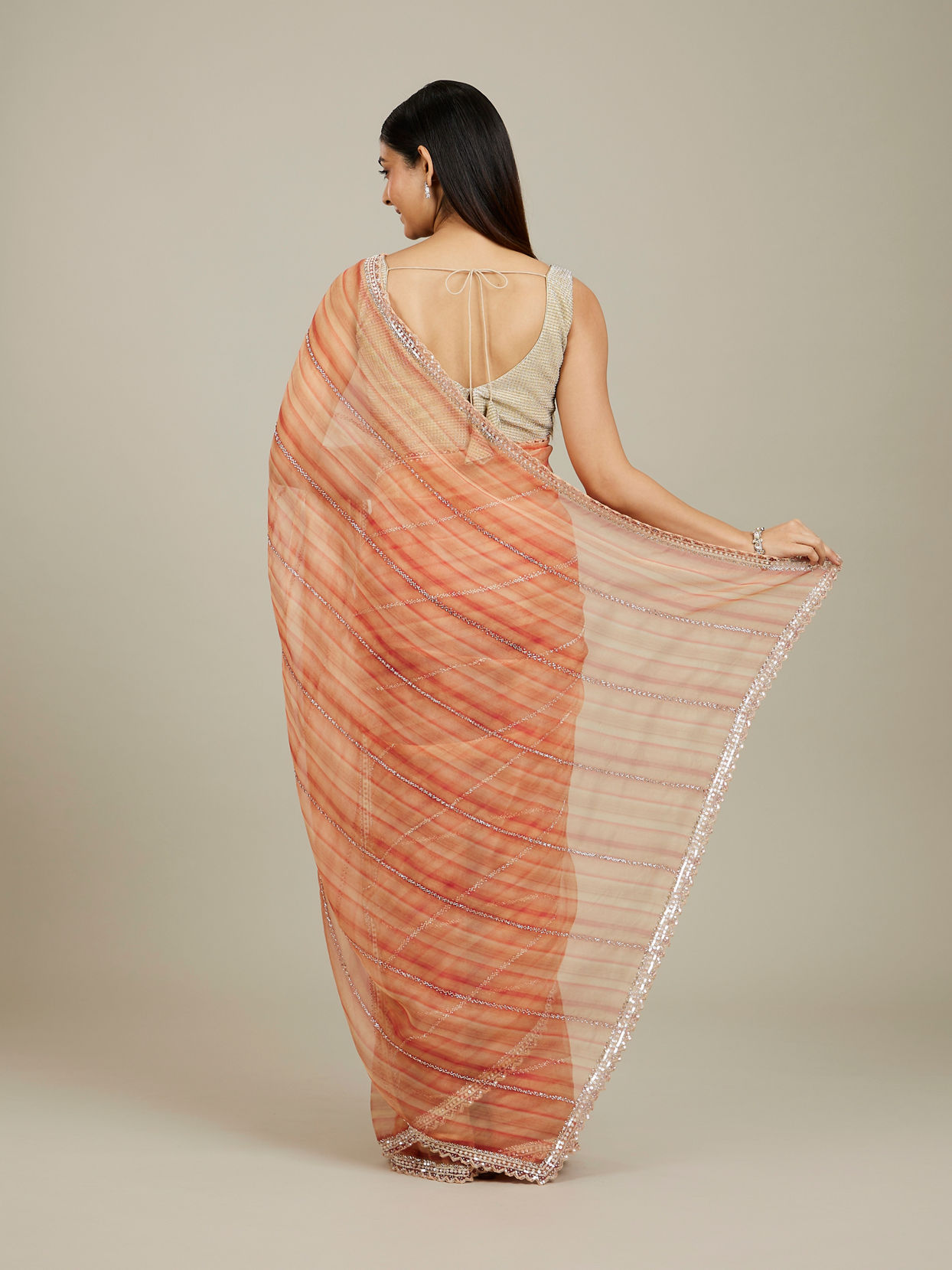 Mohey Women Rust Red Diagonal Striped Saree with Cutdana And Sequin Work