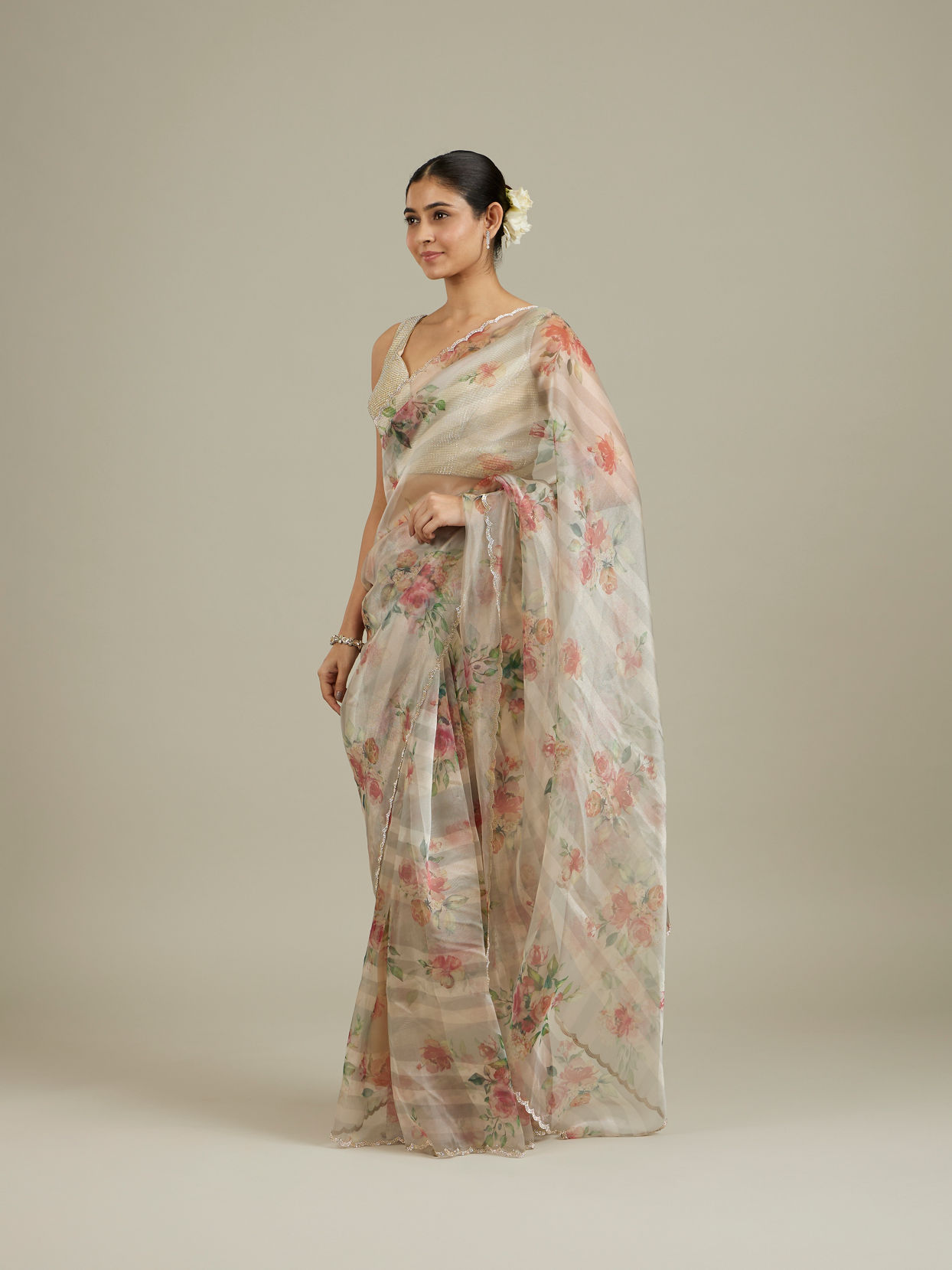 Mohey Women Soft Cream Floral Printed Saree with Scalloped Rhinestone Border