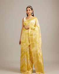 Mohey Women Canary Yellow Floral Grid Patterned Saree with Intricate Borders And Tassel Trims