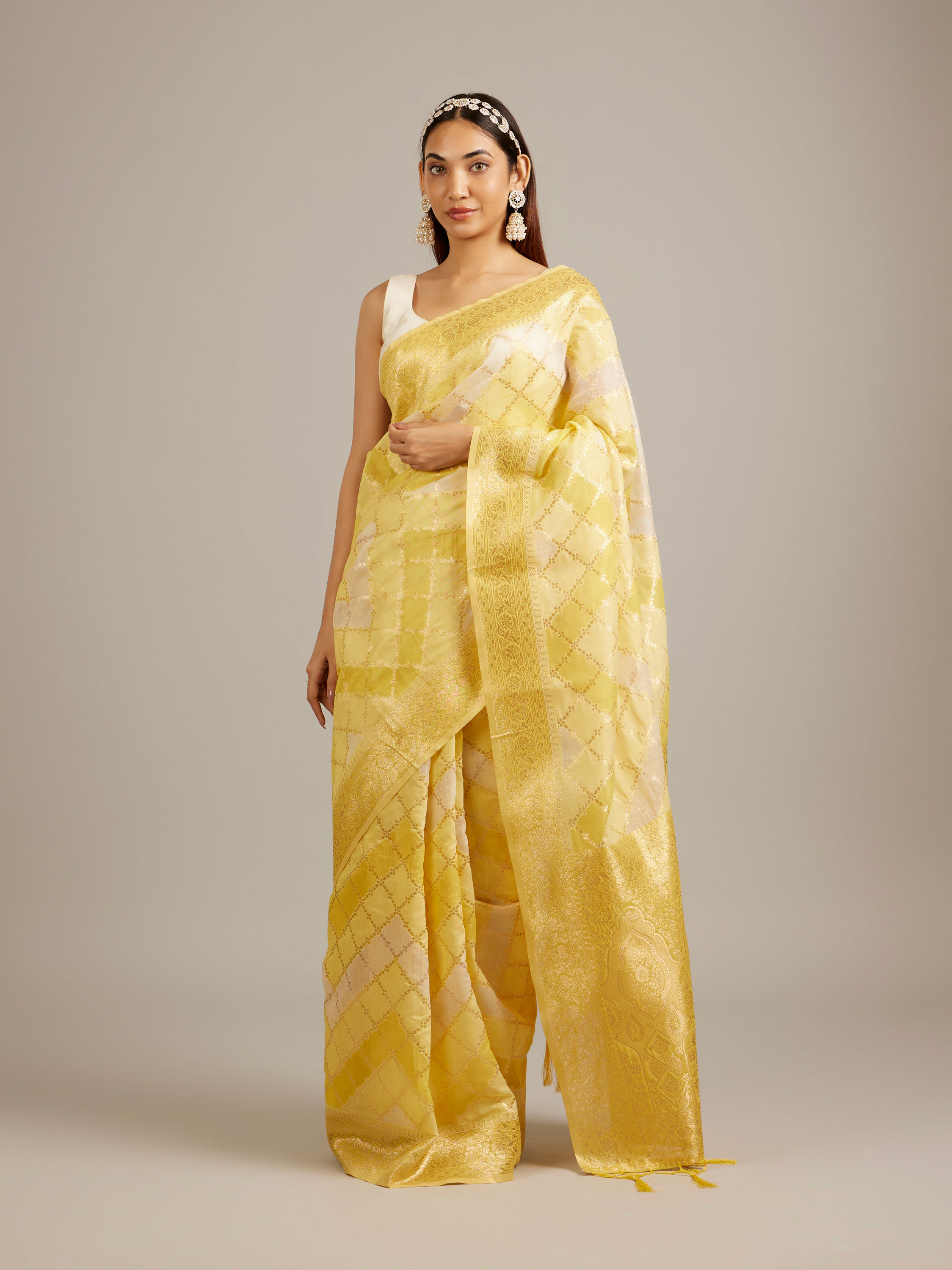 Mohey Women Canary Yellow Floral Grid Patterned Saree with Intricate Borders And Tassel Trims