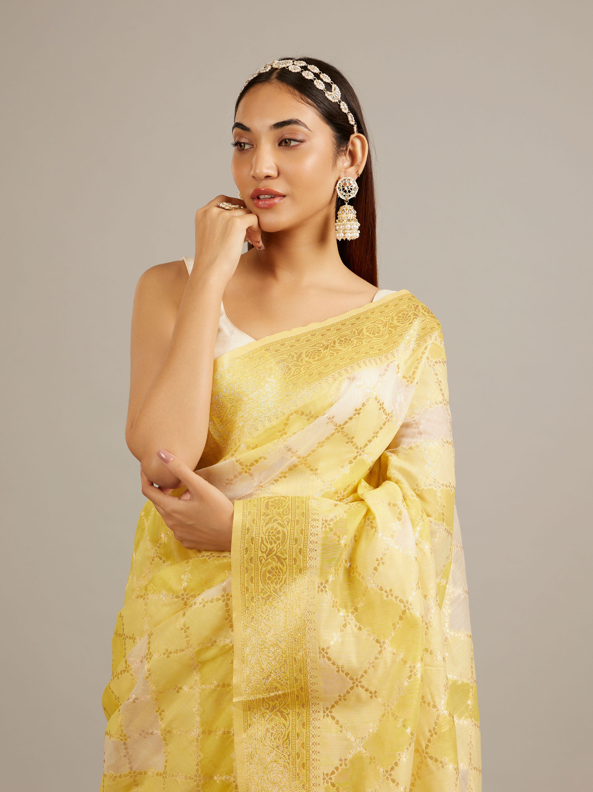 Mohey Women Canary Yellow Floral Grid Patterned Saree with Intricate Borders And Tassel Trims